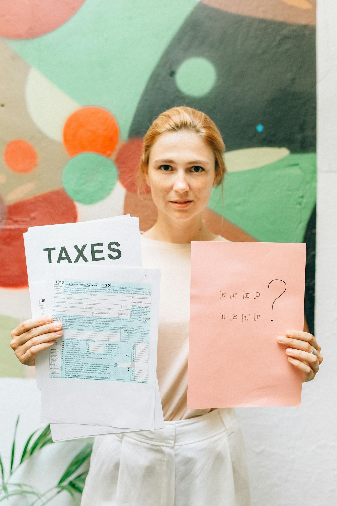 Home A Professional Woman Holding Tax Documents And